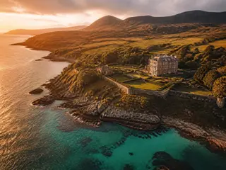Ardfin Estate on the Isle of Jura seen from the sea at golden hour