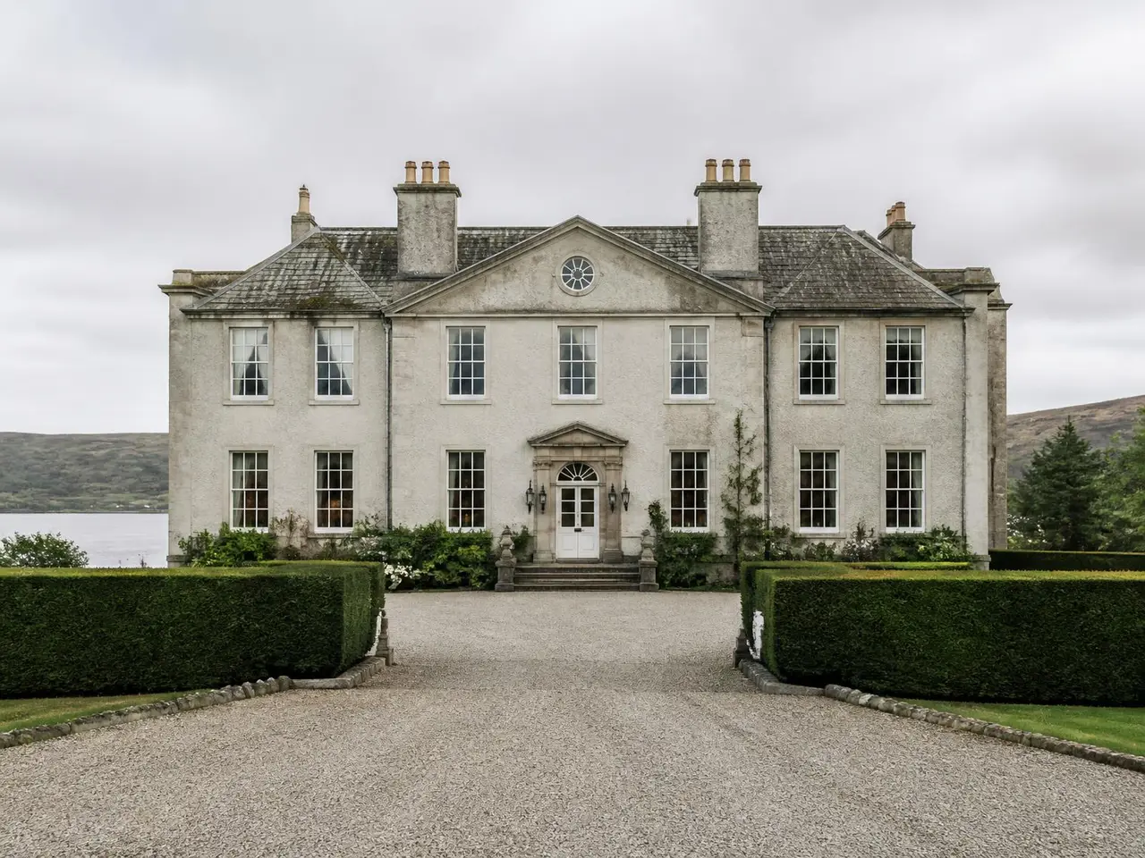 The Georgian facade of the house at Ardfin Estate from the gravel approach