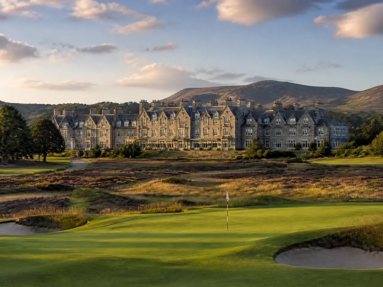 Wide view of the Gleneagles hotel across the 18th green of the King's Course